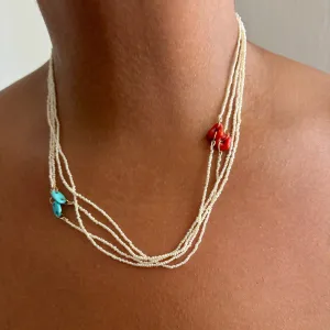 red coral and tiny tiny tiny pearls