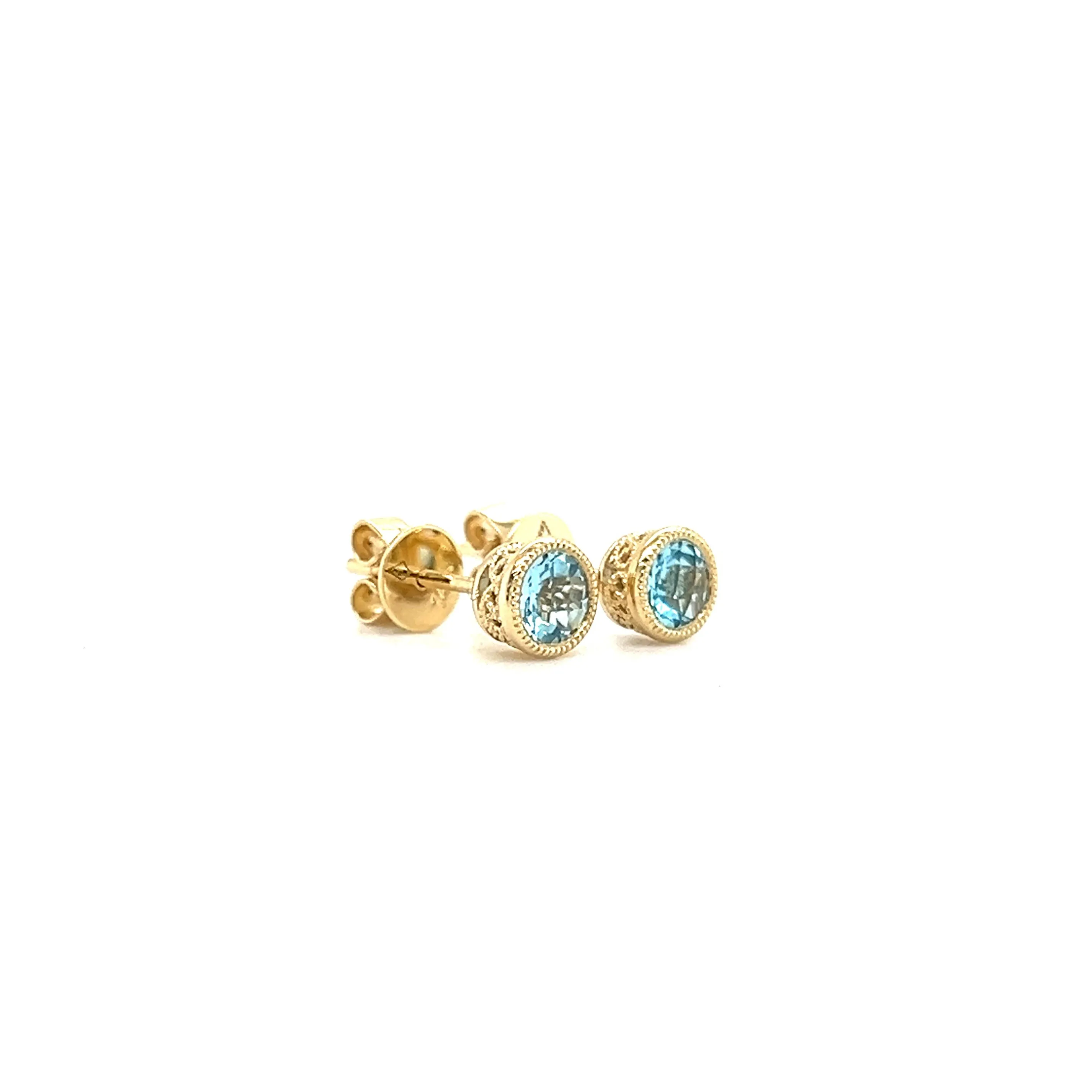 Round Blue Topaz Stud Earrings with Filigree and Milgrain Details in 14K Yellow Gold