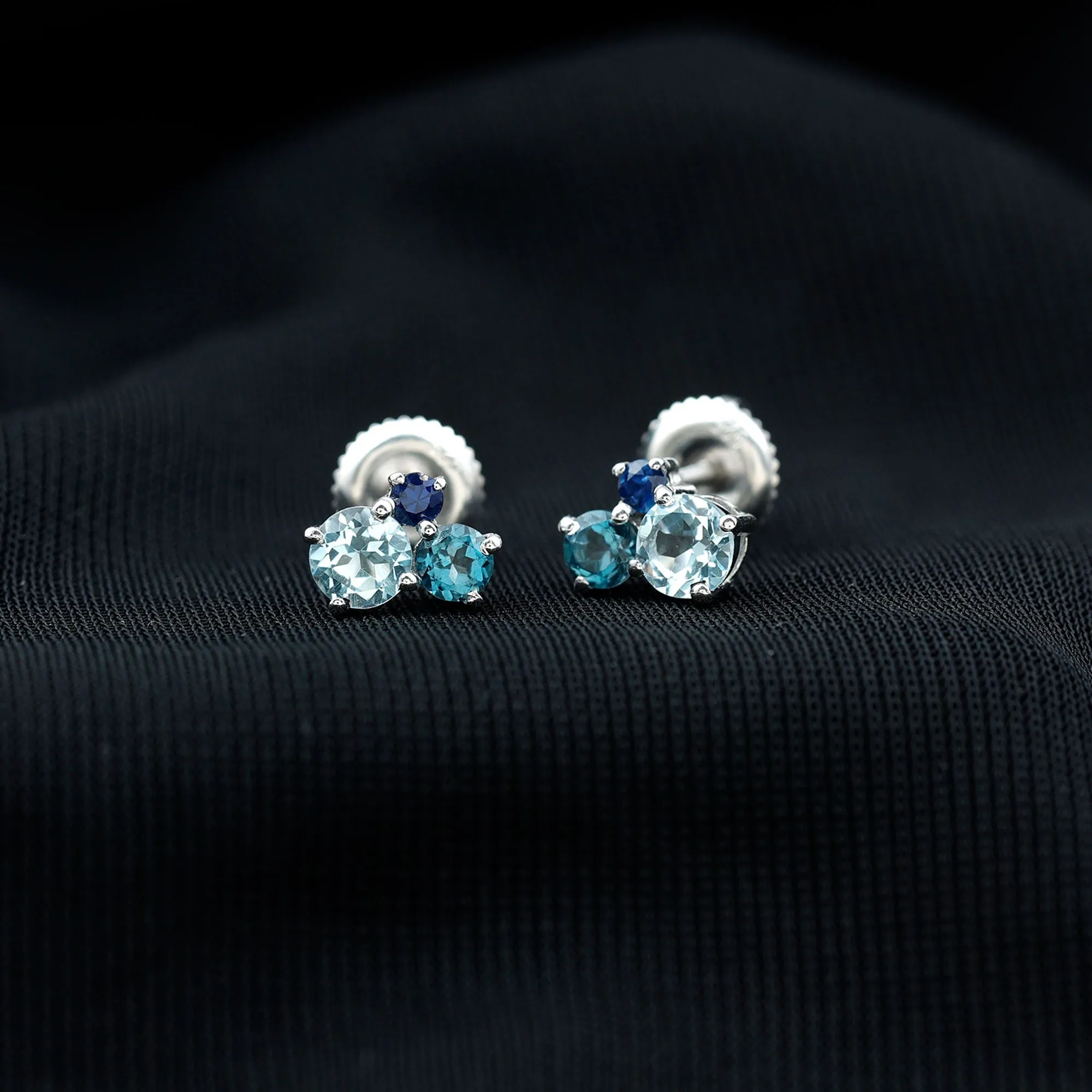 Sky Blue Topaz Three Stone Stud Earrings with London Blue Topaz and Blue Sapphire