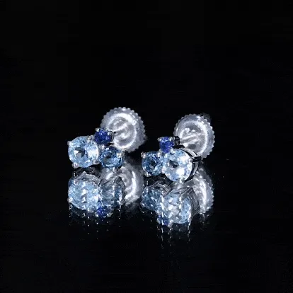 Sky Blue Topaz Three Stone Stud Earrings with London Blue Topaz and Blue Sapphire