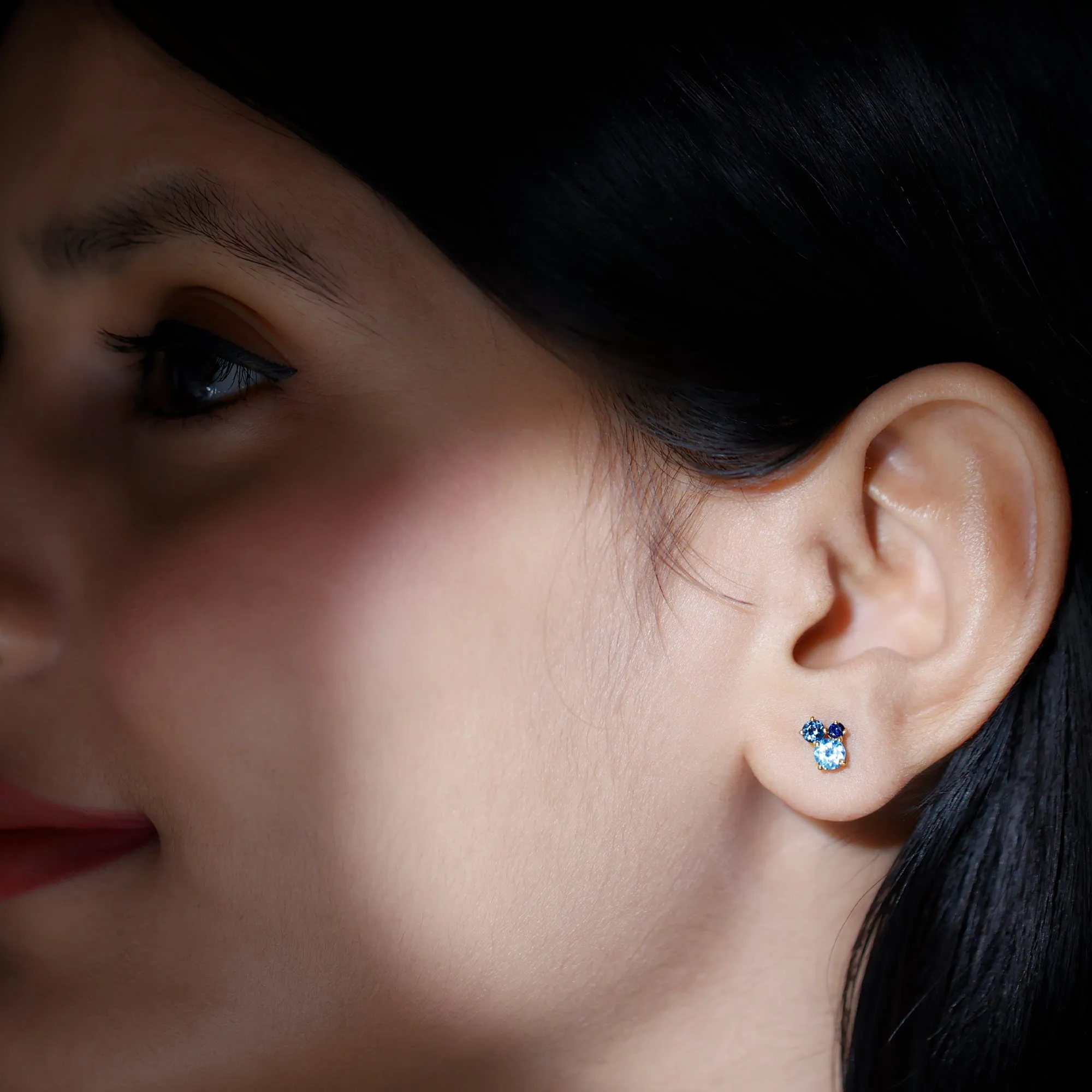 Sky Blue Topaz Three Stone Stud Earrings with London Blue Topaz and Blue Sapphire