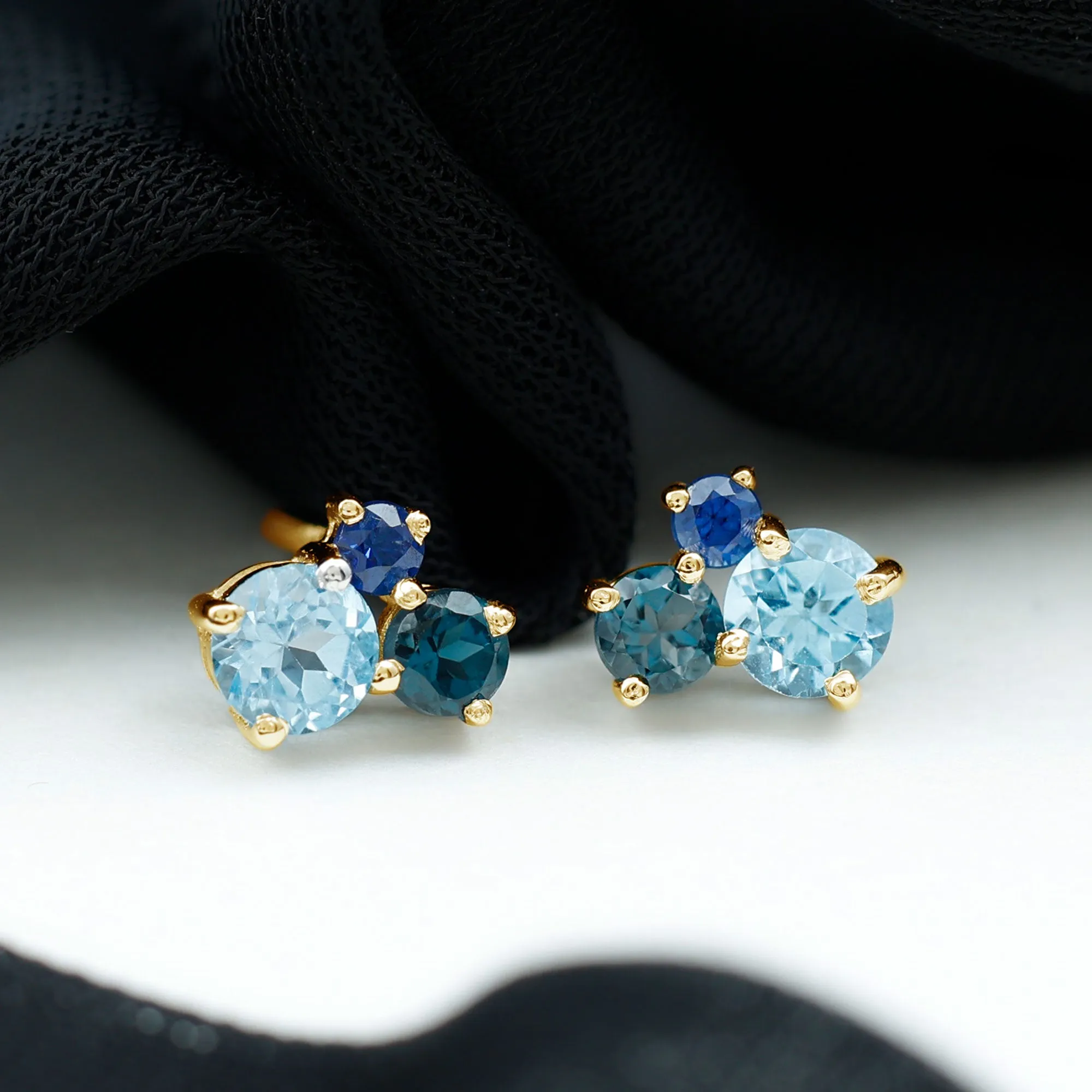 Sky Blue Topaz Three Stone Stud Earrings with London Blue Topaz and Blue Sapphire