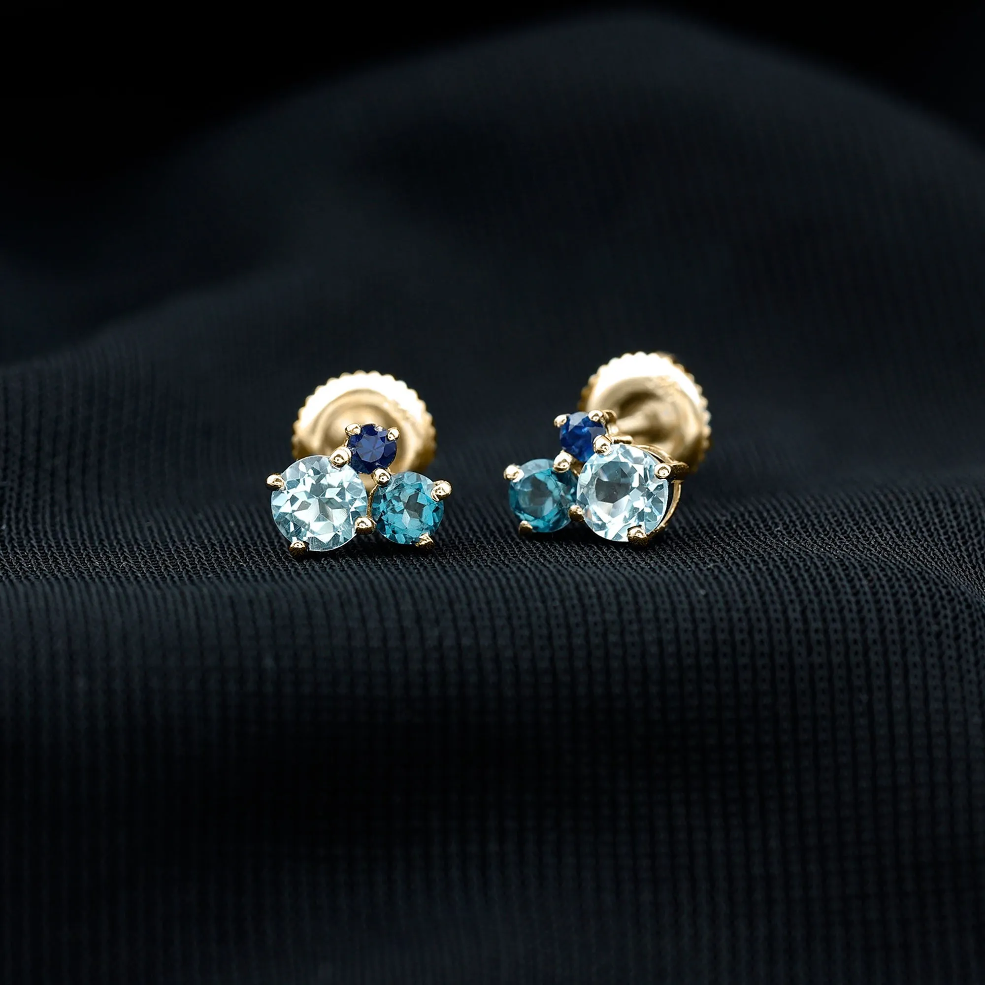 Sky Blue Topaz Three Stone Stud Earrings with London Blue Topaz and Blue Sapphire